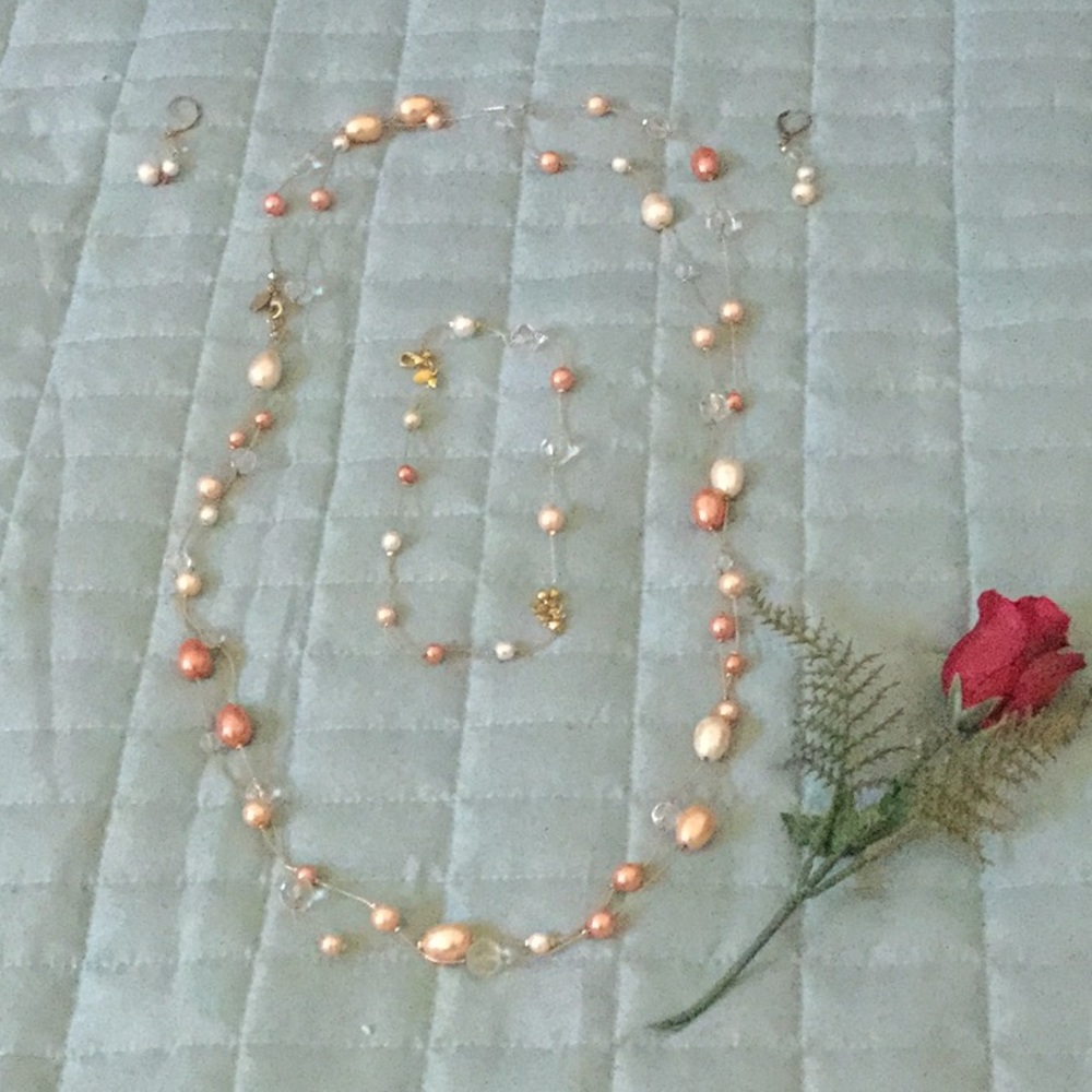 Beaded necklace, earrings and anklet.